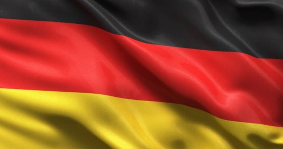 The national flag of Germany waving.