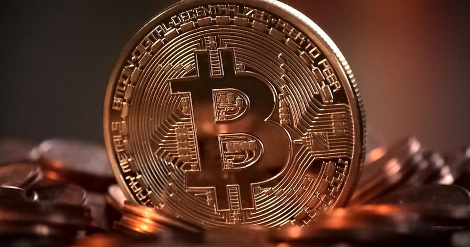 Close-up metallic visual of a Bitcoin coin