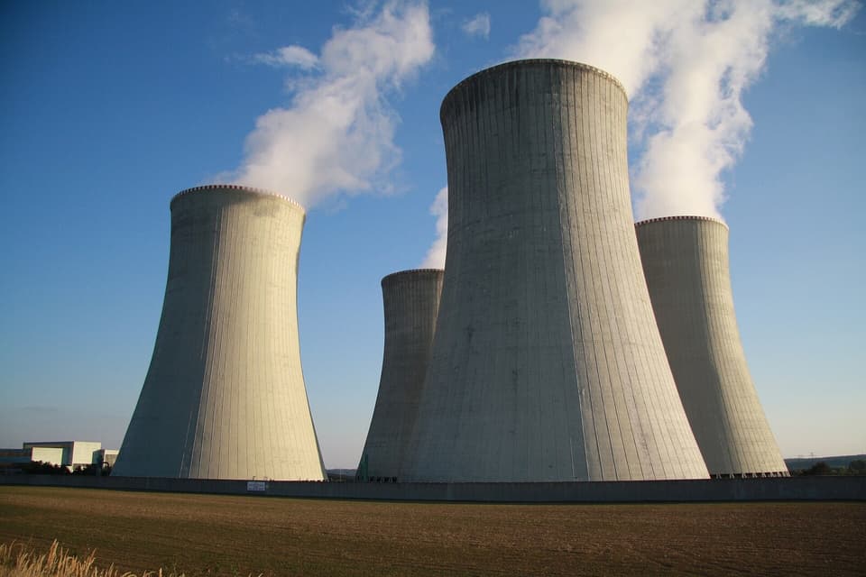Large cooling towers of an industrial energy facility